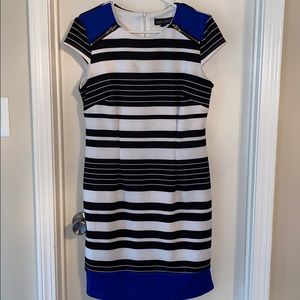 Blue, black, and white short dress